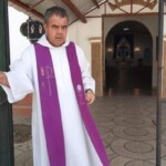 Fr.-Jorge-Donaire-opening-the-church-for-confessions.-Nuestra-Señora-de-Suyapa-Mission.-San-Pedro-Sula