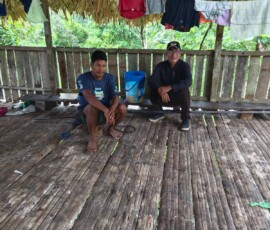 2025 Peru - Fr. Romulo visiting a leader of a community.