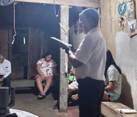2025 Peru - A small community in prayer.